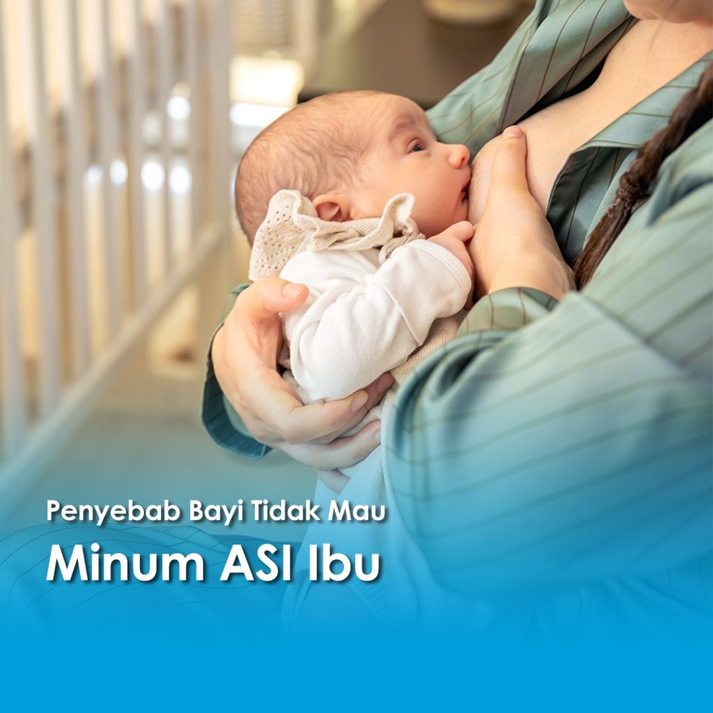 Seorang ibu menyusui bayinya yang baru lahir sambil menggendongnya dengan lembut. Teks dalam gambar berbunyi “Penyebab Bayi Tidak Mau Minum ASI Ibu”.