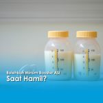 Bolehkah Minum Booster ASI Saat Hamil? Dua botol ASI dengan tutup kuning sebagai ilustrasi topik seputar konsumsi ASI booster pada ibu hamil.