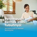 Ibu menggendong anak dan terdapat tulisan "Perempuan Berhan atas Tubuhnya"